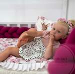 ochraniacz warkocz do łóżeczka malinowy.jpg